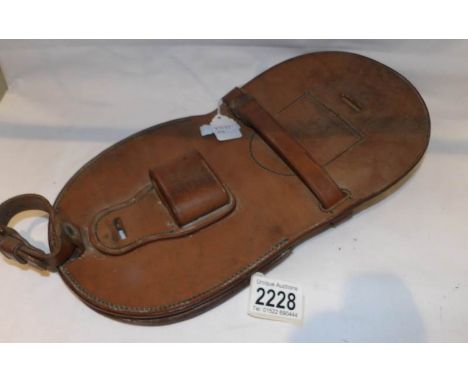 A military leathe mule/horse shoe and nail travelling pouch embossed with war office arrow and '....&amp; Sons Ltd., Walsall,