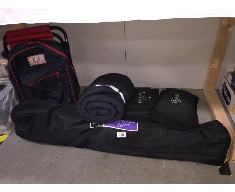An LA Fitness folding chair, backpack/stool, Yoga mat and 2 headrests