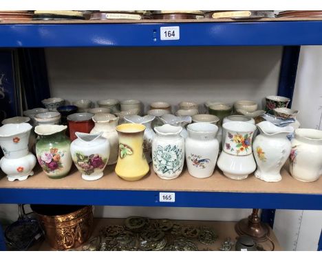Approximately 36 vintage ceramic toothbrush pots