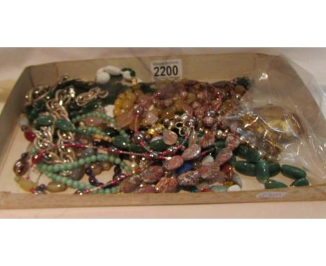 A mixed lot of costume jewellery including silver ring, vintage brooch with earrings etc.,