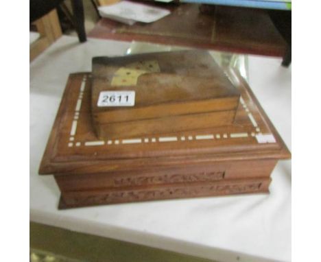 A playing card box and one other.