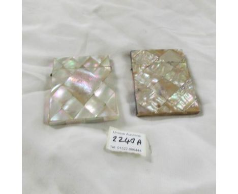 2 mother of pearl card cases.