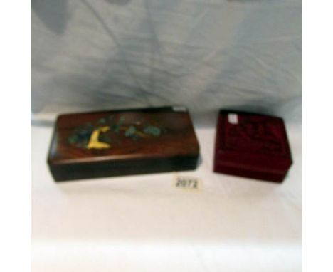 An early Chinese 20th century box with mother of pearl inlay and a 19th century lacquered box.