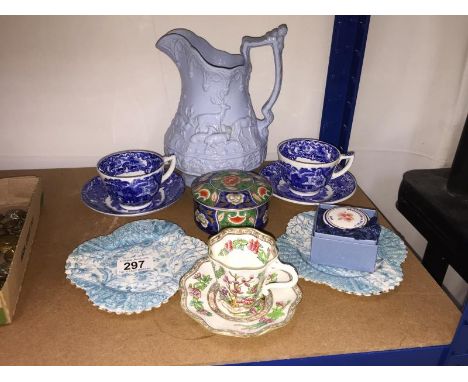 A mixed lot of china including cups, saucers, lidded pots etc.
