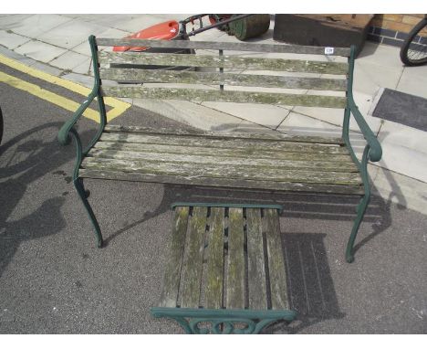 A garden bench with cast iron ends &amp; a stool