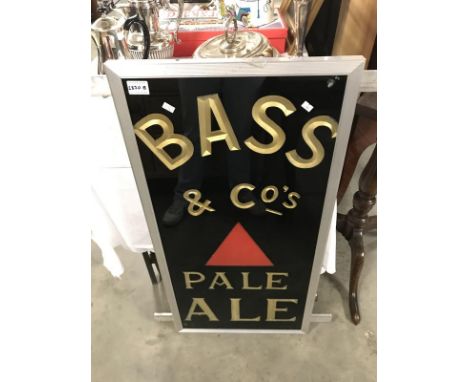 An architectural Bass sign on a 36" x 18" x 1" thick slate