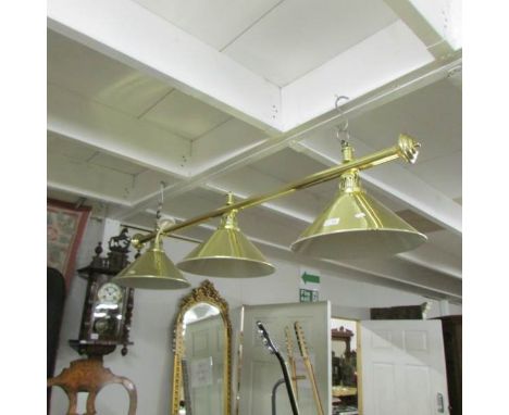 A triple over head snooker table light.