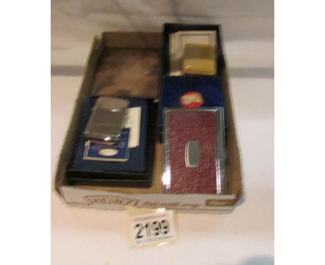 A Halcyon days enamel patch box, a card case, a cigarette case etc.,