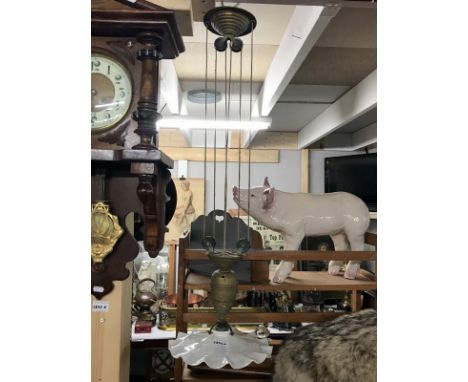 An Edwardian brass rise &amp; fall ceiling light with white glass shade