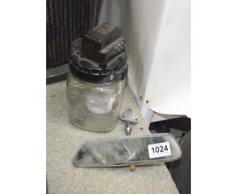 A Lucas glass screen washer bottle and a Lucas rear view mirror