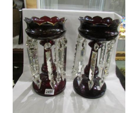A pair of Victorian ruby glass lustres.