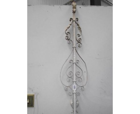 A painted wrought iron shop sign light bracket