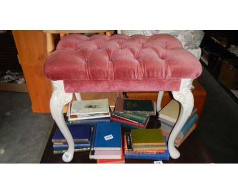 A pink velour dressing table stool