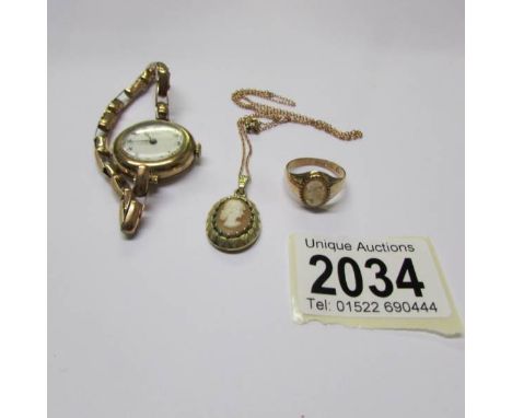 A ladies Buren wristwatch in 9ct gold case (HM London import, 1930), a 9ct gold ring set cameo portrait (HM London 1976) and 