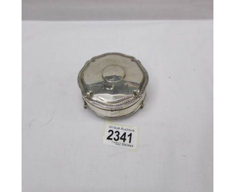 A silver trinket box.