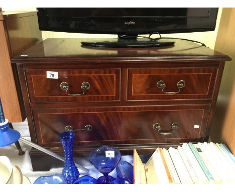 A 2 drawer TV cabinet with video/DVD shelf