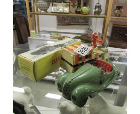 A Schuco 4001 tinplate clockwork car, A Dinky 825 Dukw and a Corgi radar van.