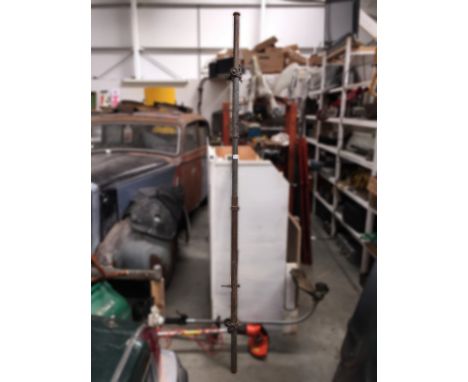 A vintage wheel alignment tracking tool