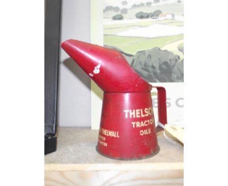 A vintage Kenneth Thelwall limited Doncaster Thelson tractor oils jug