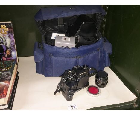 A Chinon camera with lenses, flash and filters