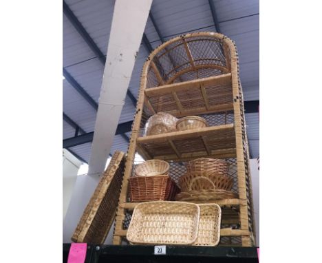 A quantity of wicker items including a shelf unit, baskets, wooden bowls etc.