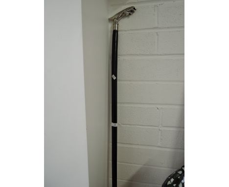 A vintage gentlemans walking stick with jaguar handle