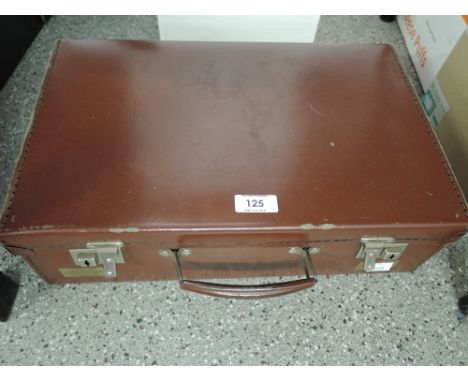 A vintage leather bound suitcase small size