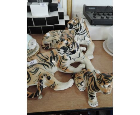 A selection of vintage tiger figures and studies