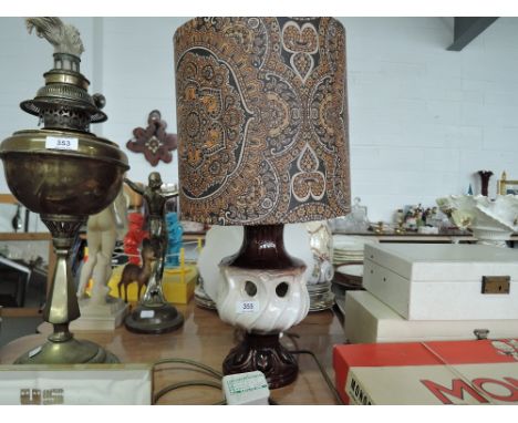 A vintage German style ceramic table lamp and shade