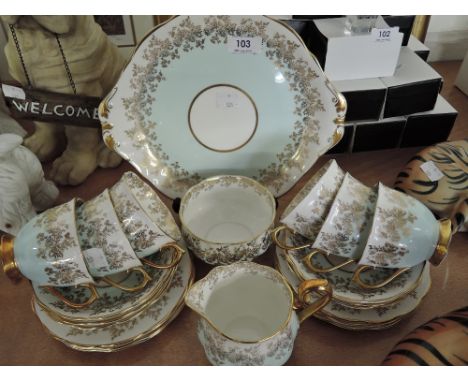 A vintage part tea service by Royal Albert with gilt edge workExcellent condition