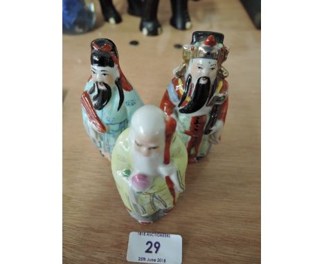 Three ceramic Chinese oriental figures, wisdom, wealth and old age