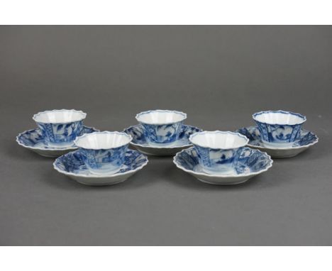 Five sets of Chinese porcelain cups and saucers with landscape decor - Kangxi period 1662-1722 Cup height: 3,7cm Diameter: 6,