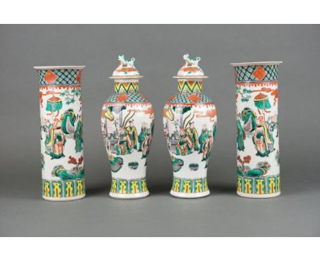 Four Chinese porcelain Wucai vases with figures -19th century- Kangxi mark Height: 28cm. Two vases in good condition. Two vas