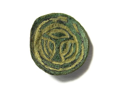 Early Anglo-Saxon Button Brooch, Circa AD 480-550. The brooch is circular in plan, demonstrating a raised edge so as to have 