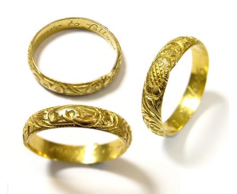 18th Century Gold Mourning Ring, Circa 1720's. A gold band of high gold content heavily engraved on the outer face with flowe