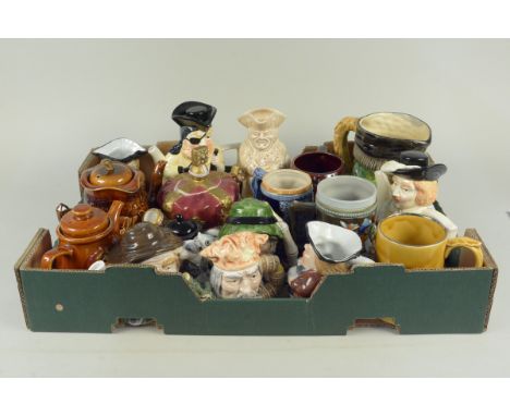 A box of vintage Toby jugs, tankards and teapots