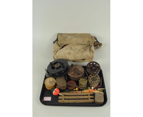 Three vintage bamboo coarse fishing rods plus five vintage reels including a Bakelite centre pin sea reel