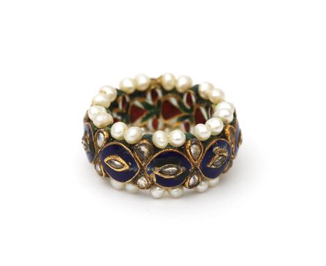An 18 karat gold enamel Kundan ring. Featuring diamonds and pearls all around. The outside with blue namel, the inside is ela