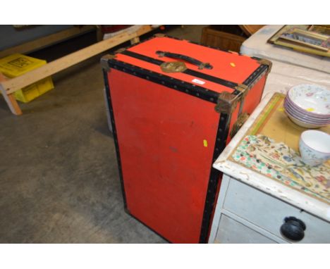 A metal bound cabin trunk