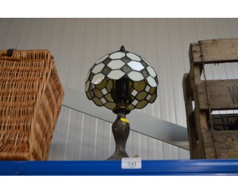 A Tiffany style lamp and shade