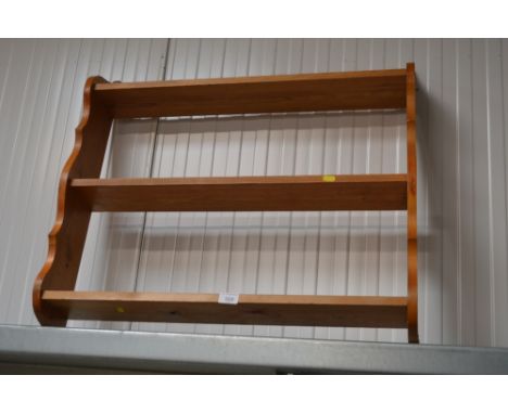 A pine hanging shelf 