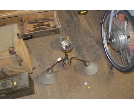 A three branch light fitting with glass shades 