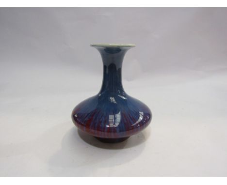 A Chinese blue and red flambé glaze slender neck vase, 13cm tall