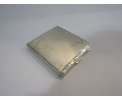 An engine-turned cigarette case stamped 925