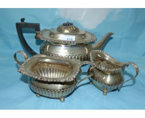 A Georgian style 3 piece tea service, rounded rectangular form with gadrooned and fluted decoration, London 1908