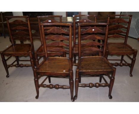 A set of 6 19th century North West dining chairs with ladder backs, square shaped top rails and tray seats, on club legs
