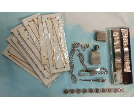 A hallmarked silver vintage “Howitt" cigarette lighter, Sheffield 1946; 2 silver bracelets; 2 Montal stainless steel and gilt