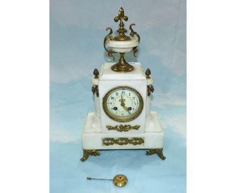 A 19th century Louis XVI white marble and ormolu mantel clock with vase finial, striking clock