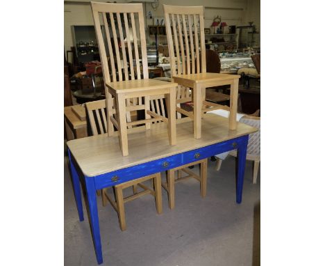 An oak scrub top kitchen table with 2 drawers and painted legs; 4 similar light oak dining chairs with high backs