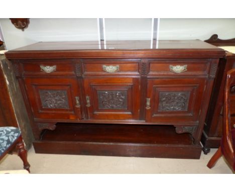 A late Victorian mahogany sideboard  with carved decorative panels, 3 cupboards, 3 drawers and shelf under, length 58"